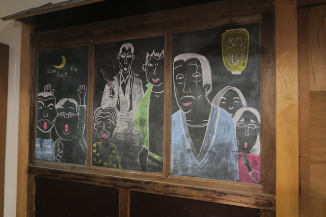 Art on the walls of Wu's Kitchen in Tainan